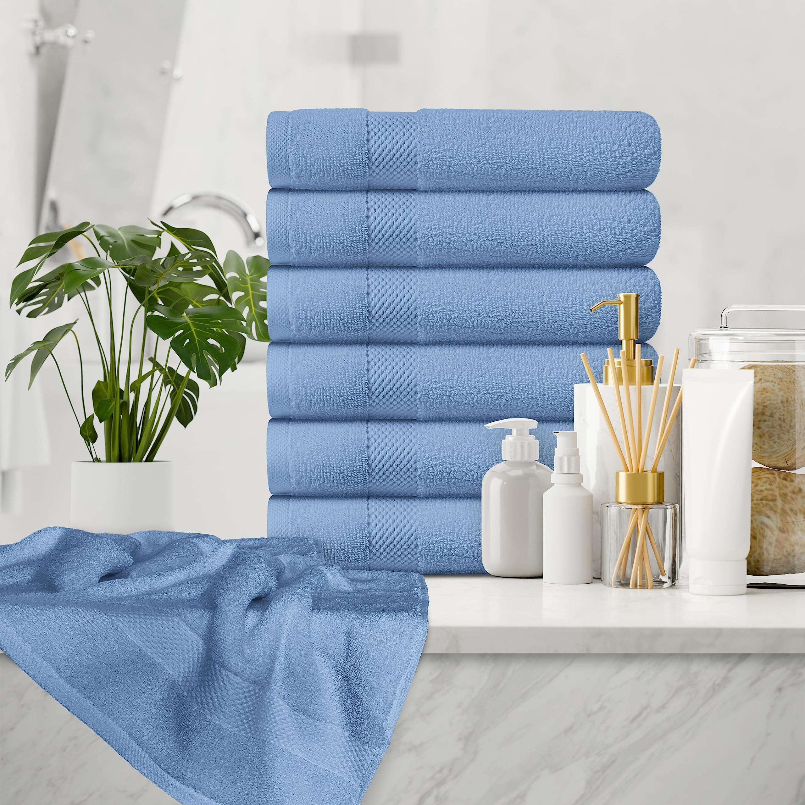White Classic rolled towels on spa tray for calm, upscale presentation