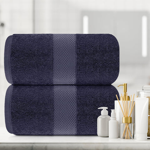 White Classic towel beside ruler for size comparison showing true 35x70-inch scale