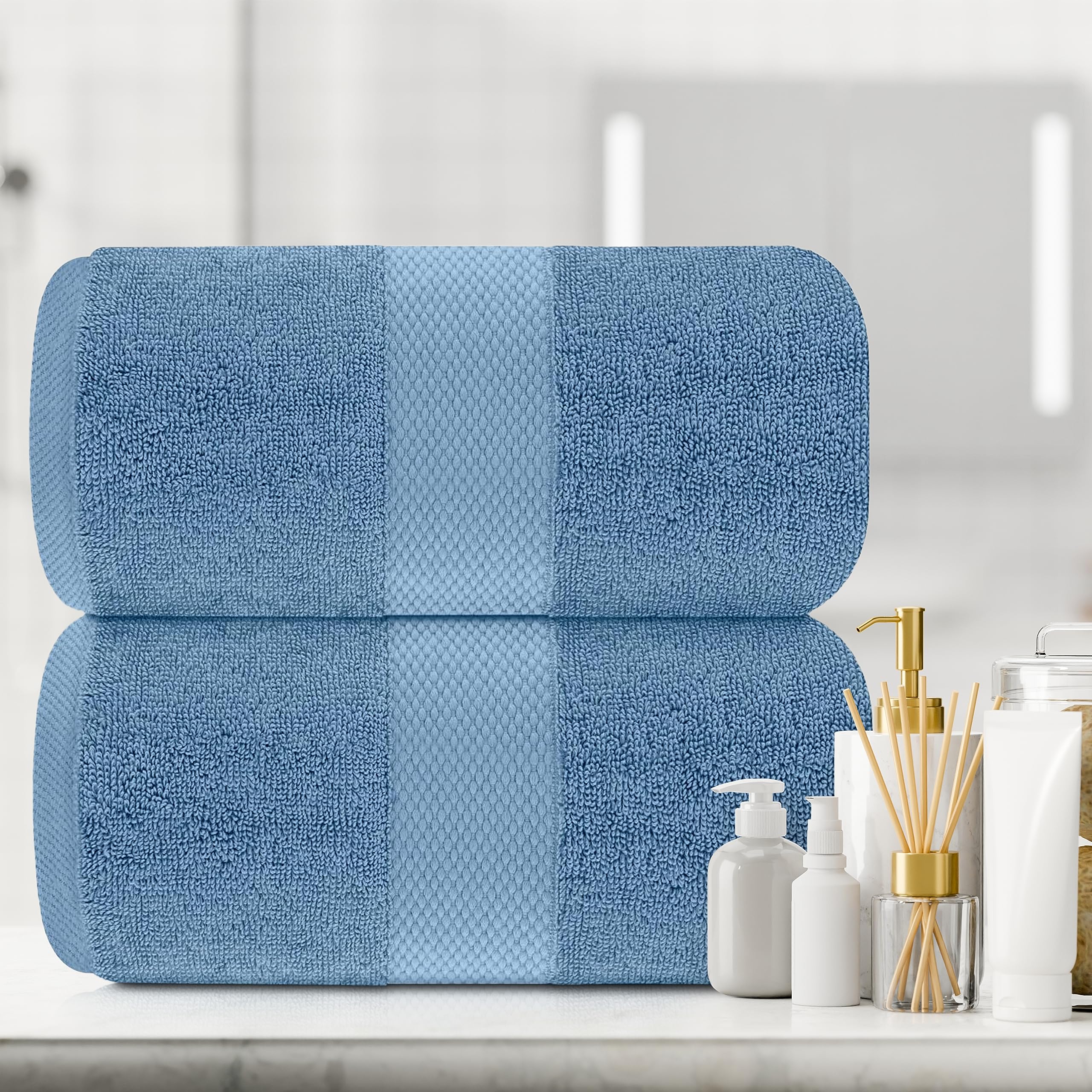 White Classic next to a standard towel showing oversized 35x70 scale advantage