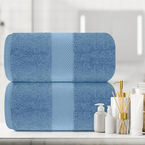White Classic next to a standard towel showing oversized 35x70 scale advantage