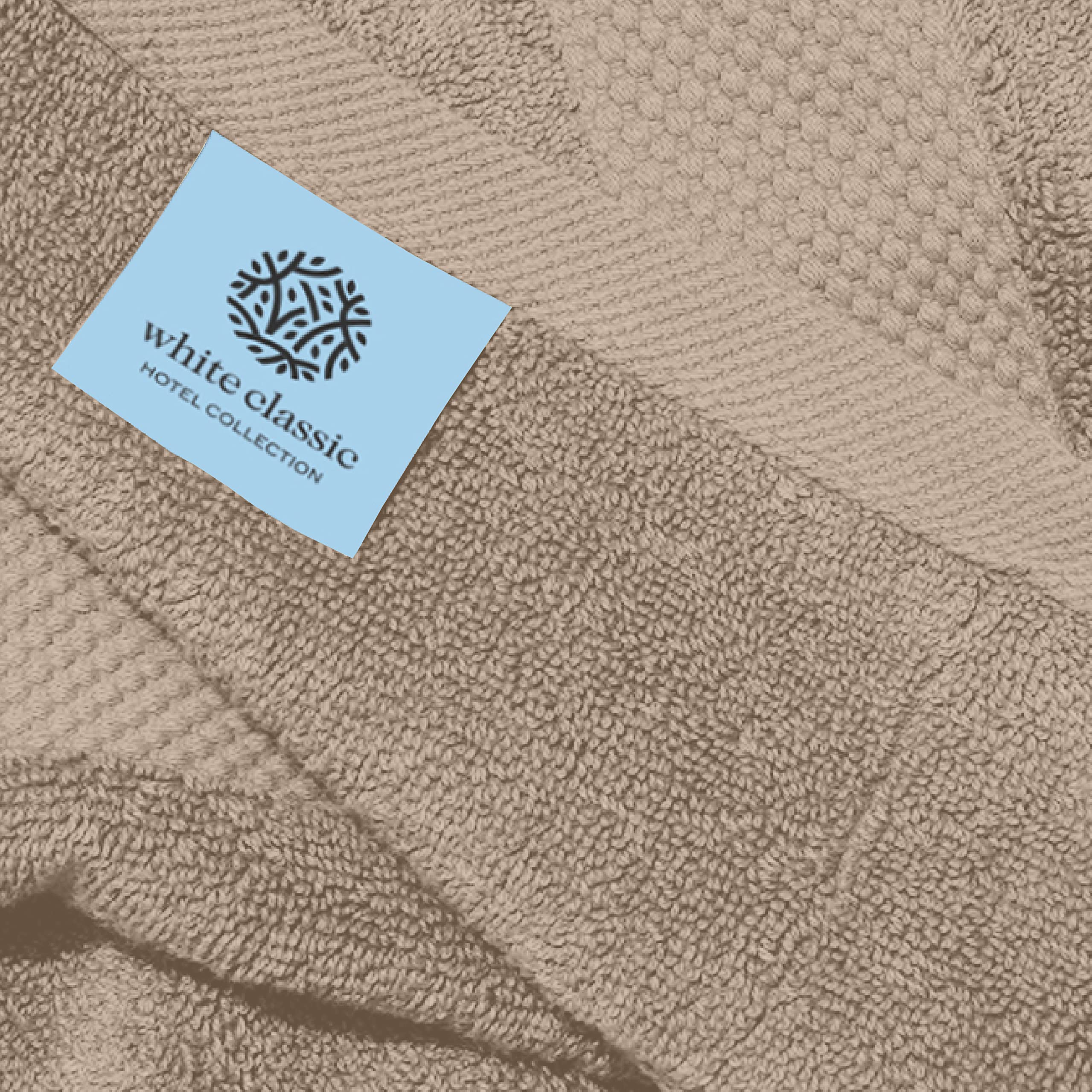 White Classic towel beside a ruler to show 16x30 inch size and generous coverage