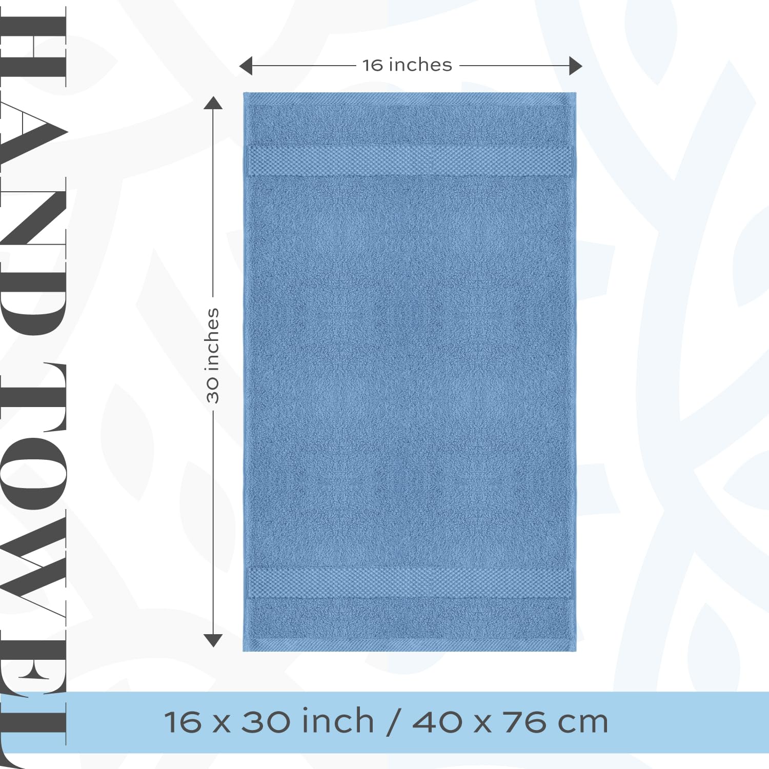 White Classic towel held in hand to show 16x30 inch size and scale