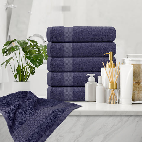 White Classic towel being used to dry hands showing quick absorbency and comfortable texture