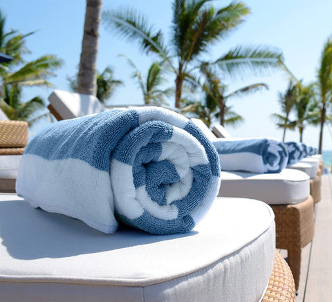 White Classic towel draped over pool chair showing 35x70 size and lounge suitability