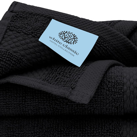White Classic stacked washcloths detail showing compact, soft usability