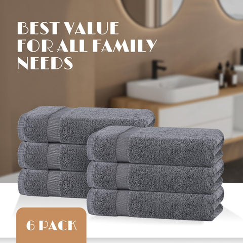 White Classic towel being used to dry hands showing quick absorbency benefit