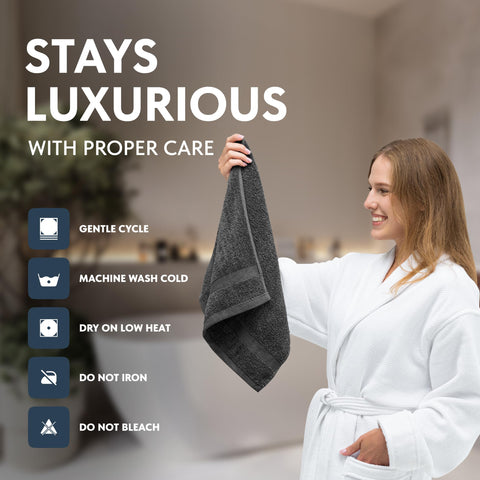 White Classic towel absorbing water from a hand to show high absorbency and quick performance