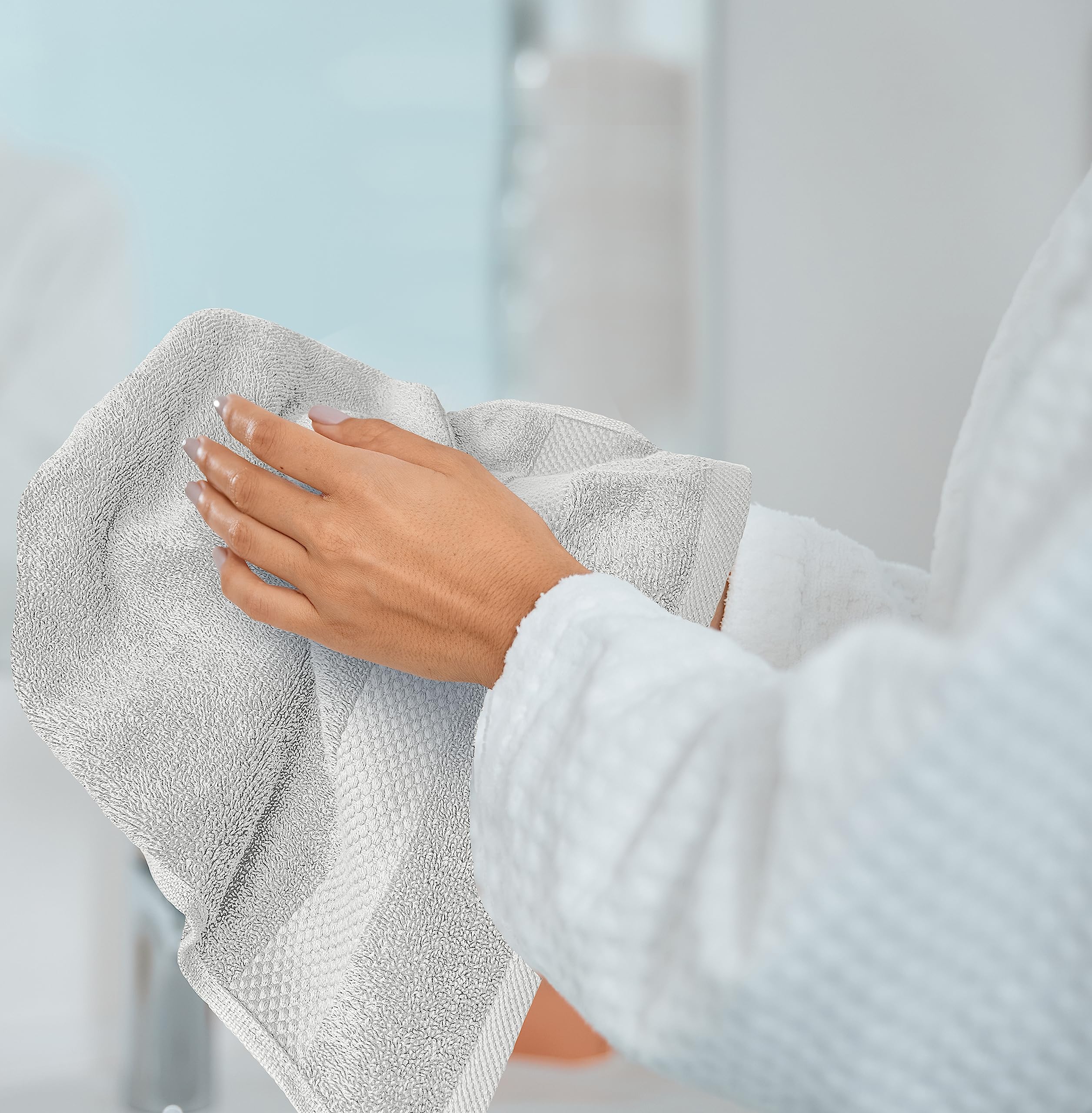 White Classic towels in spa-like setting creating an elevated bathroom look