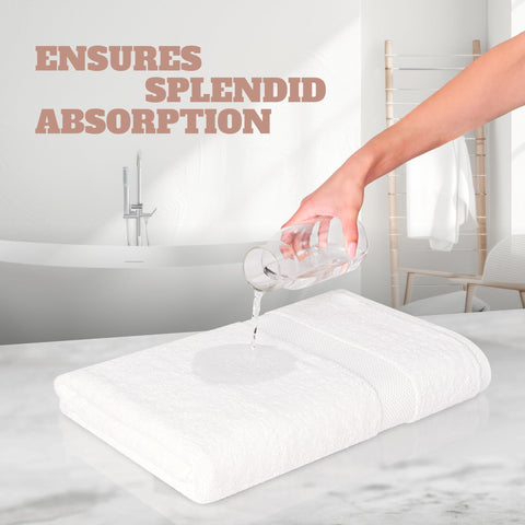 White Classic towel held by hand showing compact 24x50-inch size
