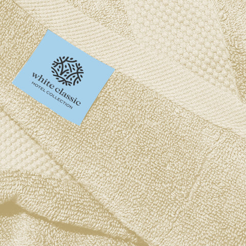 White Classic towel in use hand-drying demonstrating fast absorbency benefit