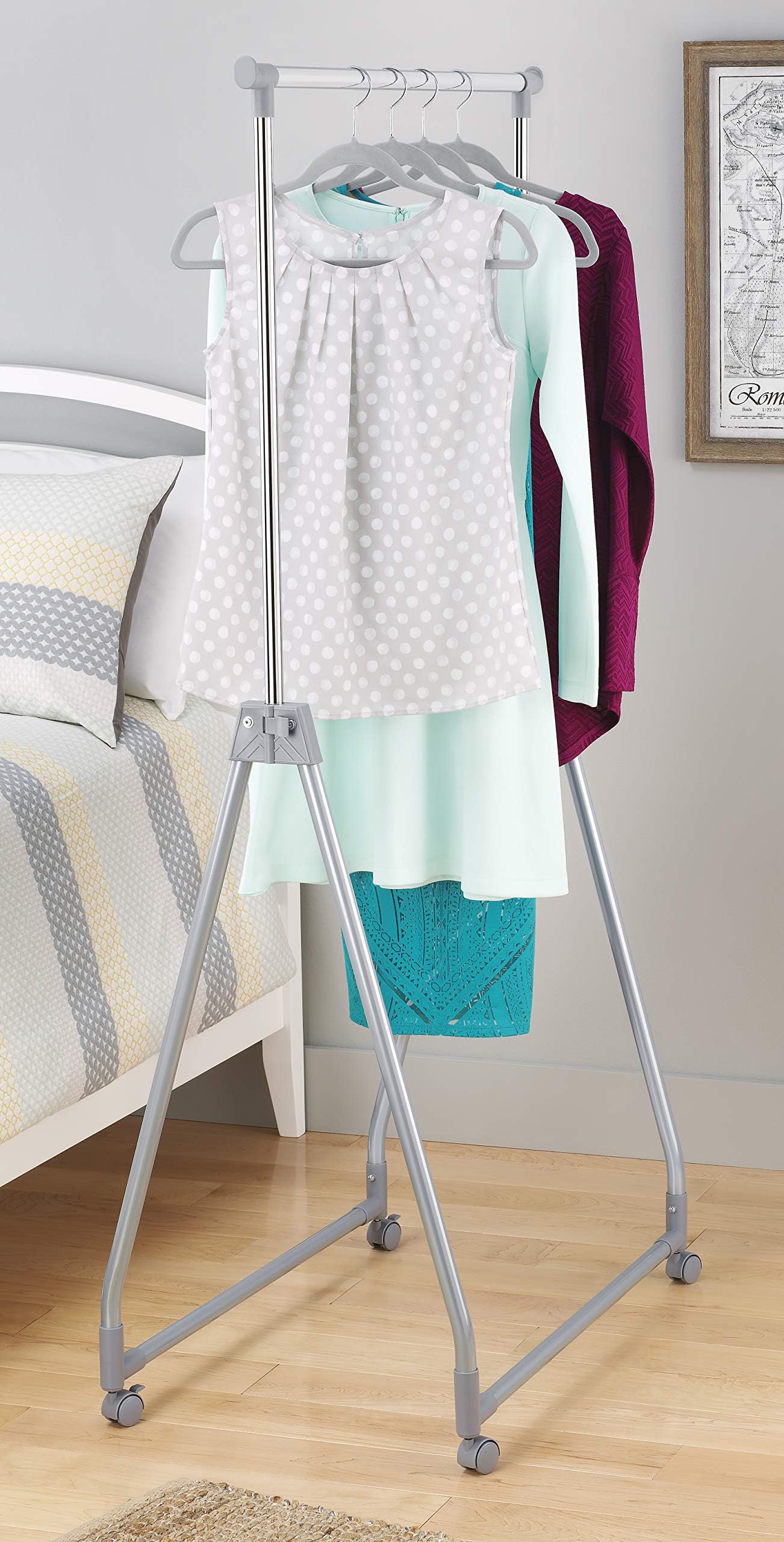 Whitmor garment rack folded flat for compact storage under bed or in closet benefit