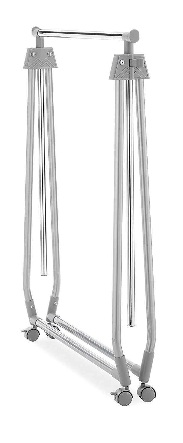 Whitmor garment rack in bedroom scene showing easy accessibility and stylish, practical storage benefit