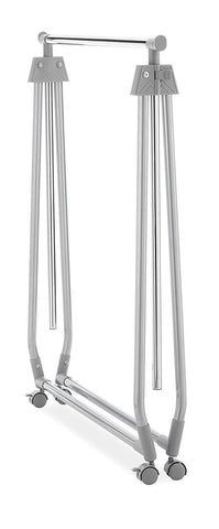 Whitmor garment rack in bedroom scene showing easy accessibility and stylish, practical storage benefit