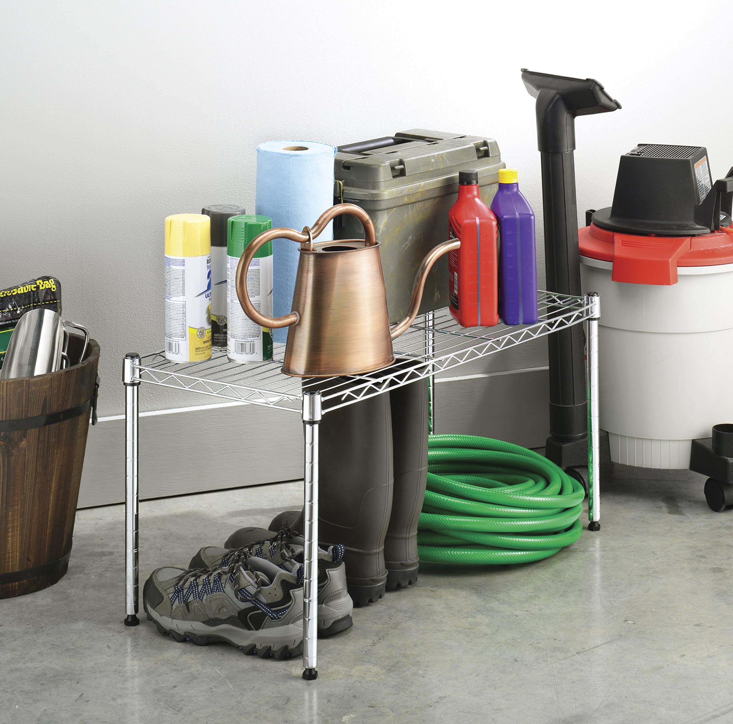 Whitmor shelf in garage organizing tools and supplies neatly