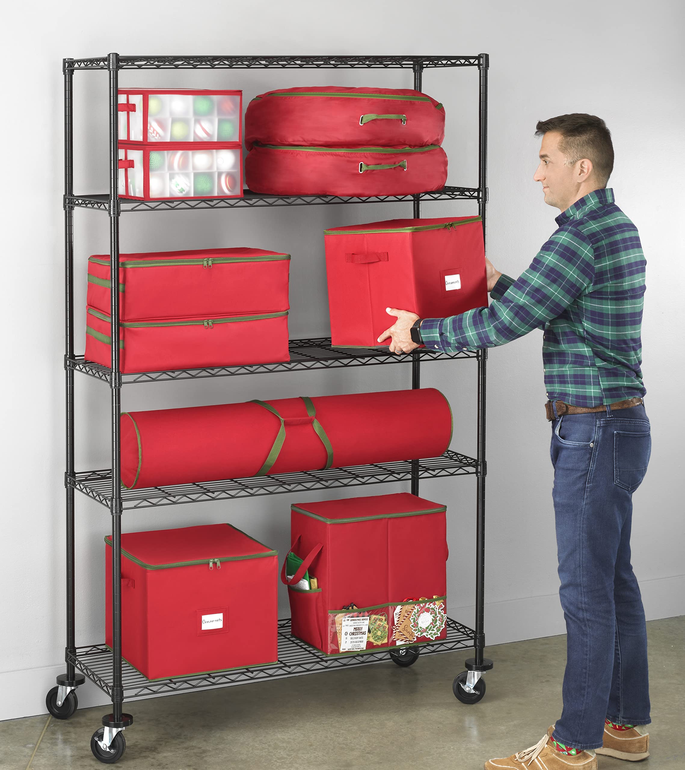 Whitmor cube placed by a decorated tree showing organized ornaments and easy access