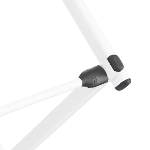 Whitmor next to a chair showing assembled height and real-world scale