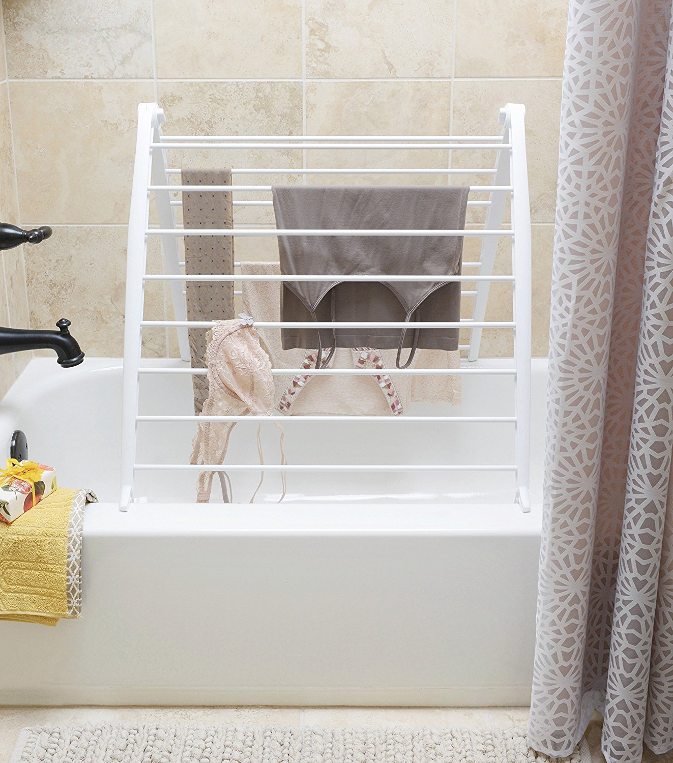 Whitmor Spacemaker leaned over bathtub demonstrating over-tub drying convenience