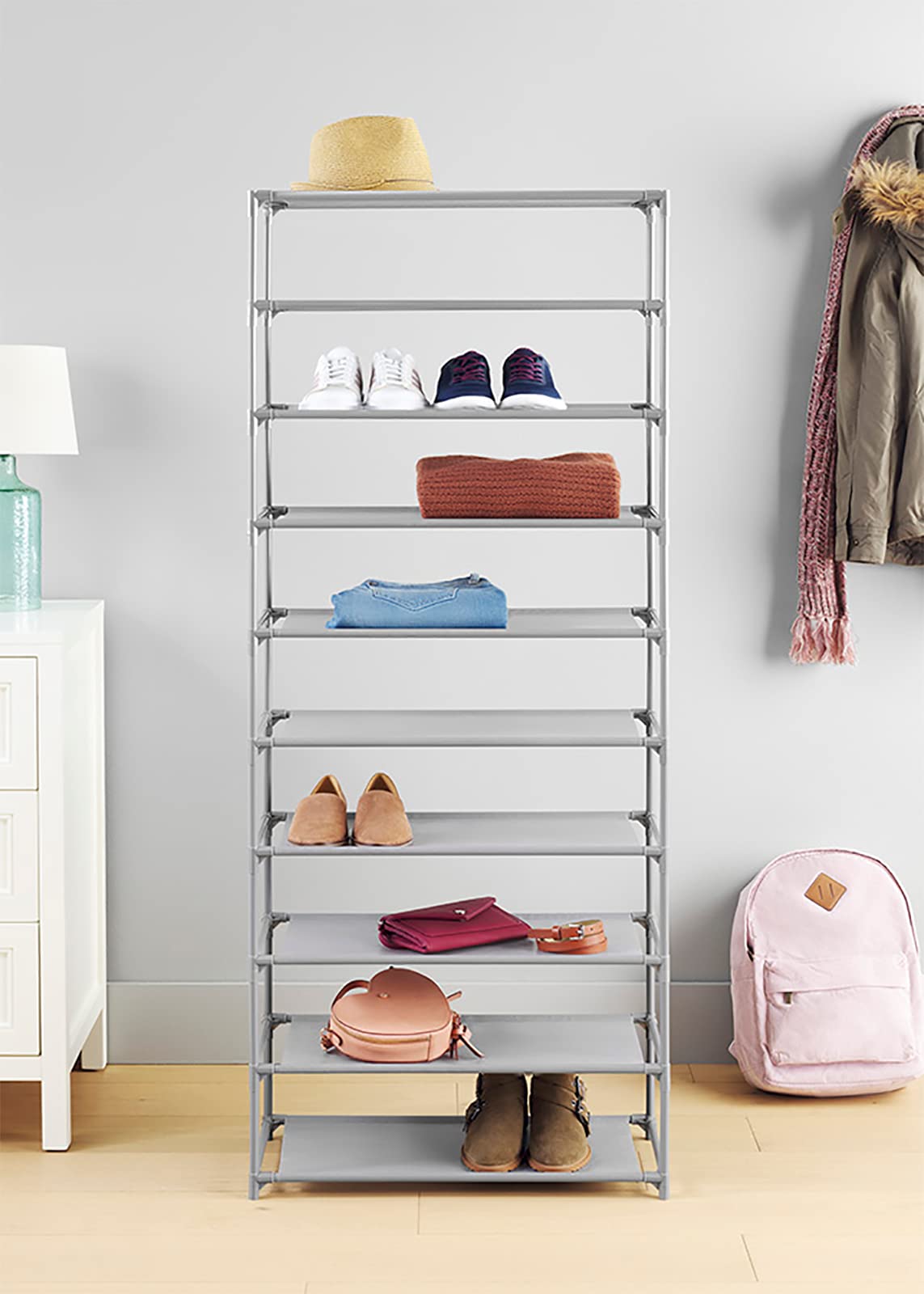 Whitmor close-up of fabric shelf texture and metal frame for easy cleaning