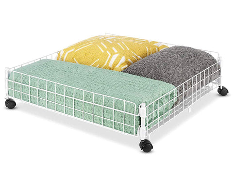 Whitmor underbed cart rolled out from under bed demonstrating easy access