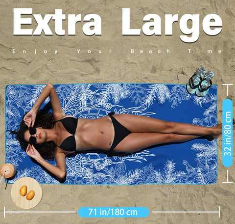 Widdonen towel unfolded beside a water bottle demonstrating full size