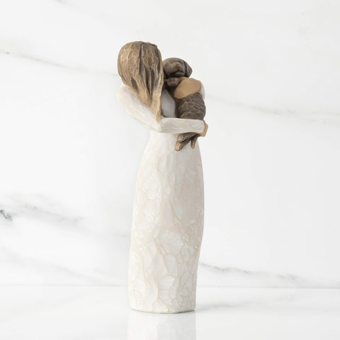 Willow Tree figure held in hand showing 7.5-inch scale for gifting