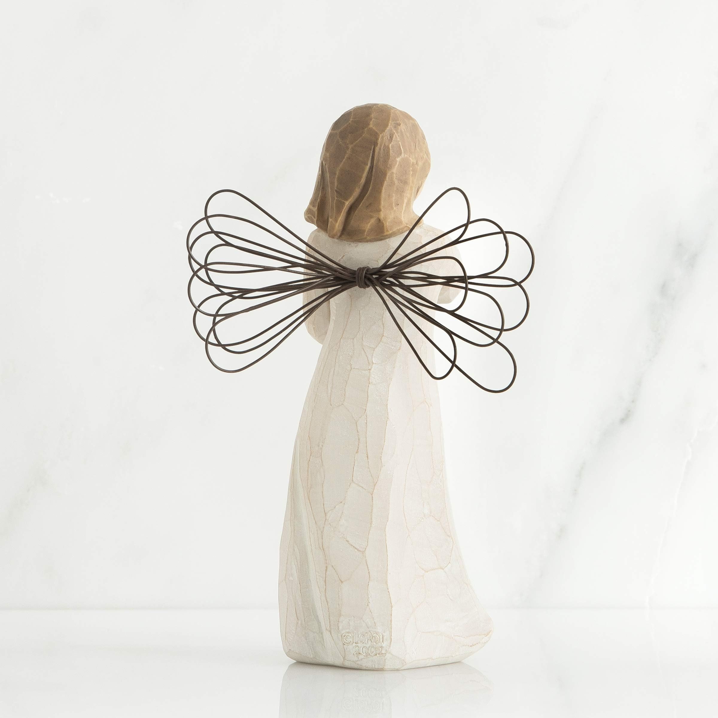 Willow Tree packaged in fitted box with enclosure card, ready for gifting and presentation