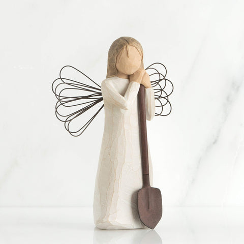 Willow Tree close-up of wire wings and brown metal shovel highlighting handcrafted detail