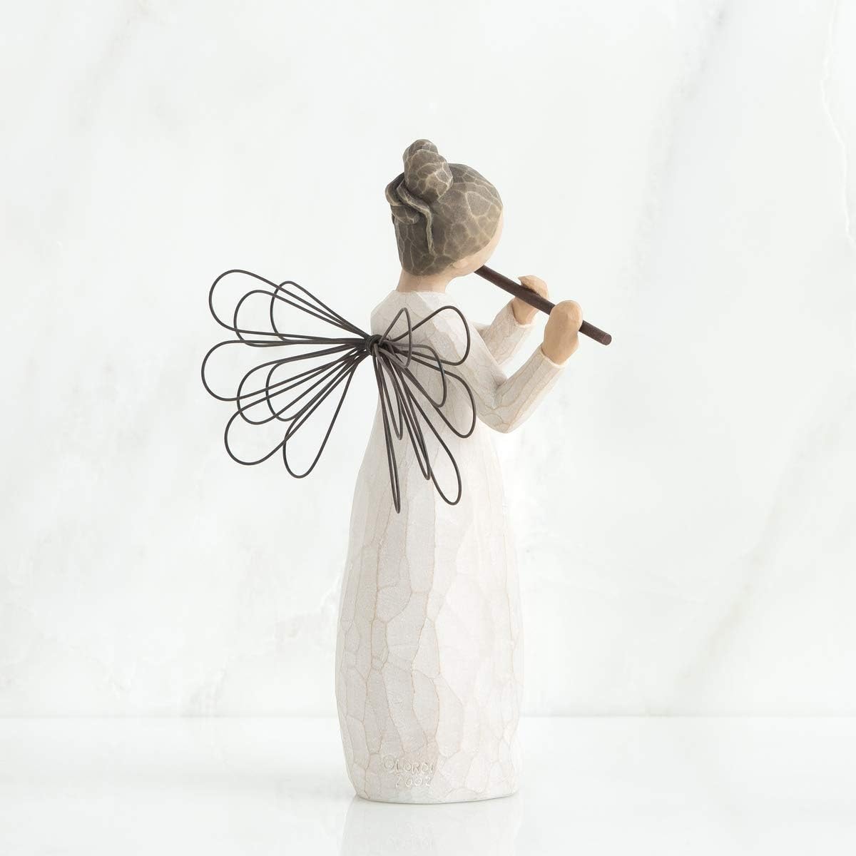 Willow Tree flute-detail close-up highlighting hand-painted texture and craftsmanship