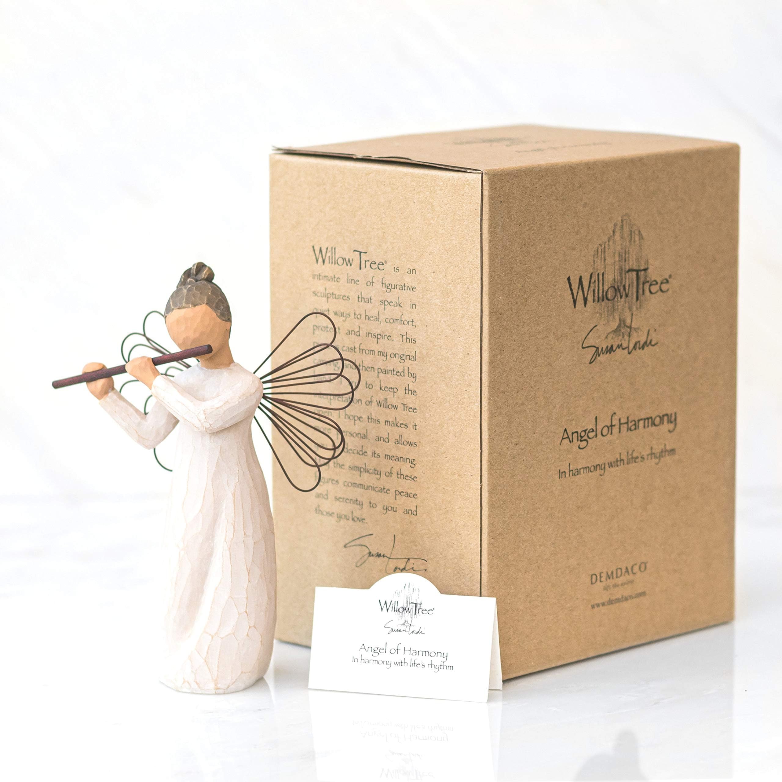 Willow Tree lifestyle display on mantel adding peaceful musical accent to room