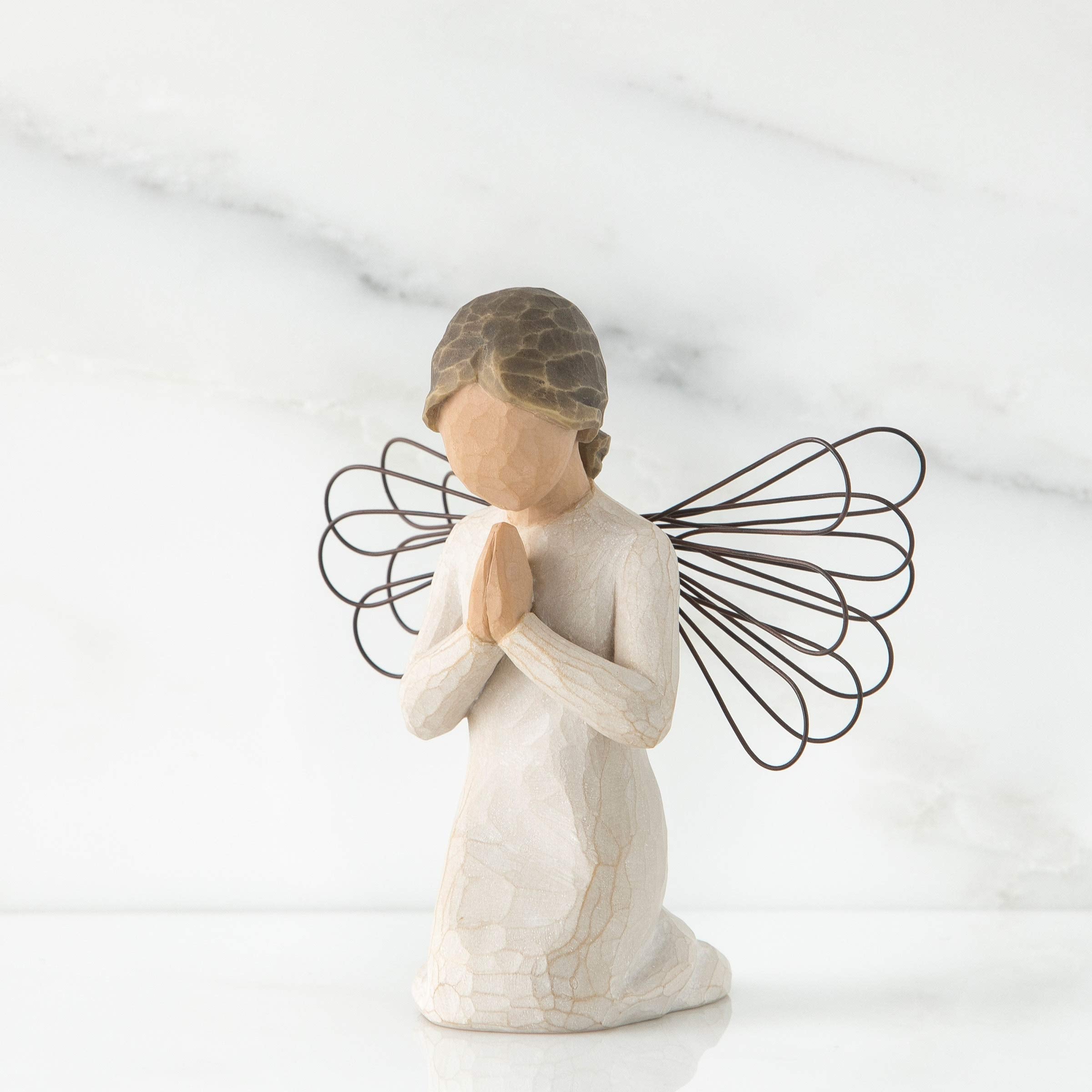 Willow Tree angel of prayer close detail of face and hands highlighting handcrafted finish