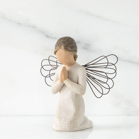 Willow Tree angel of prayer close detail of face and hands highlighting handcrafted finish