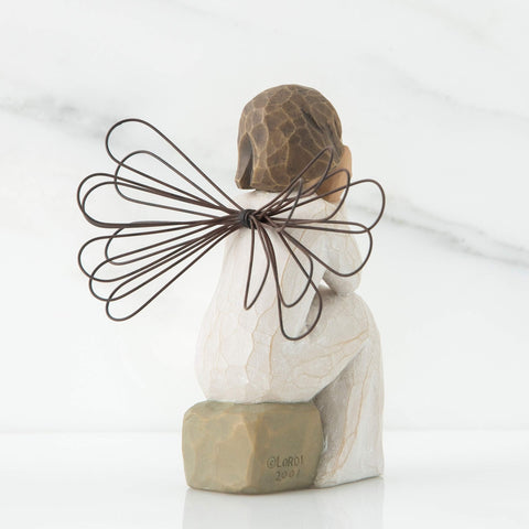 Willow Tree Angel displayed on shelf illustrating scale and décor harmony