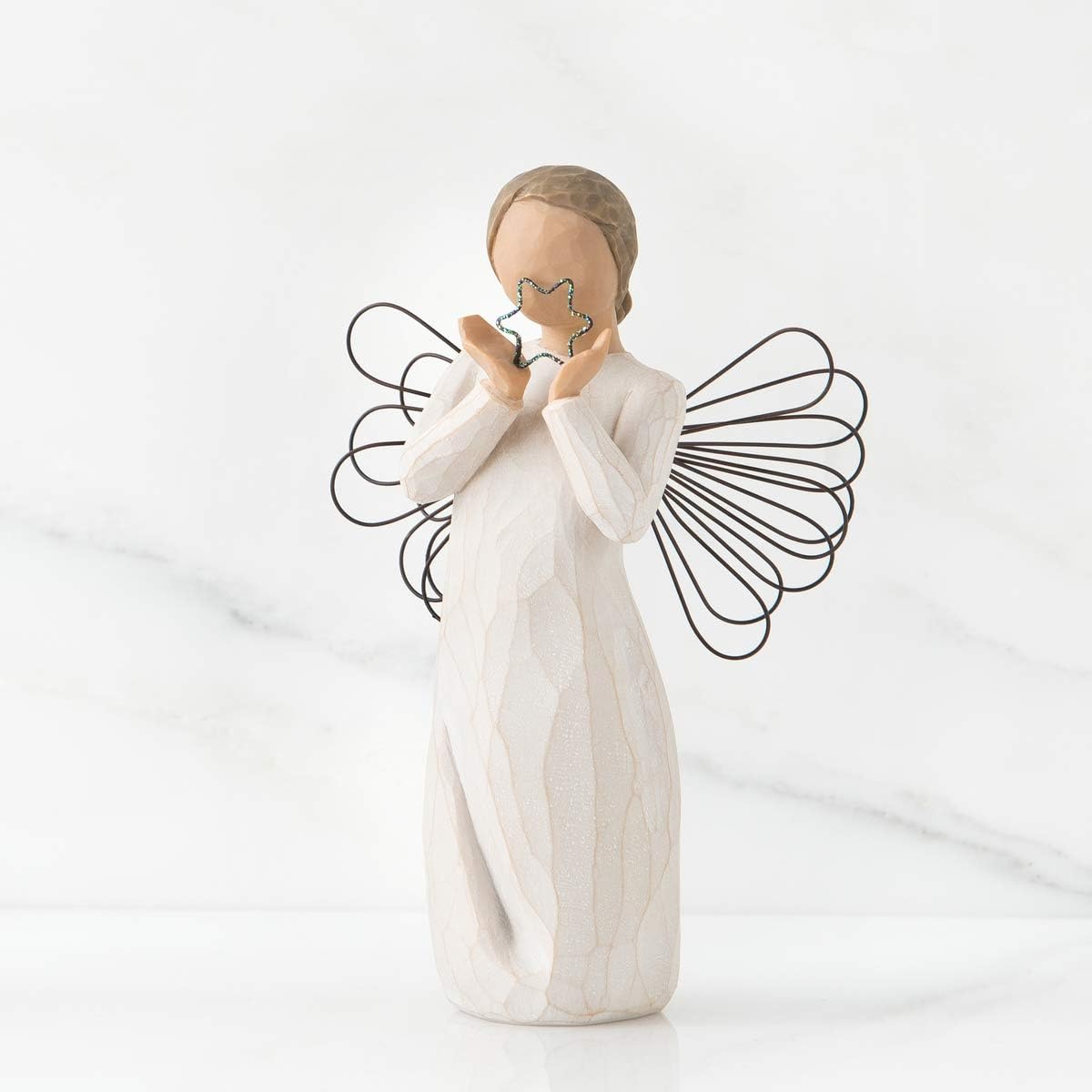 Willow Tree Bright Star close-up of hand-painted texture and carved detail, highlights craftsmanship
