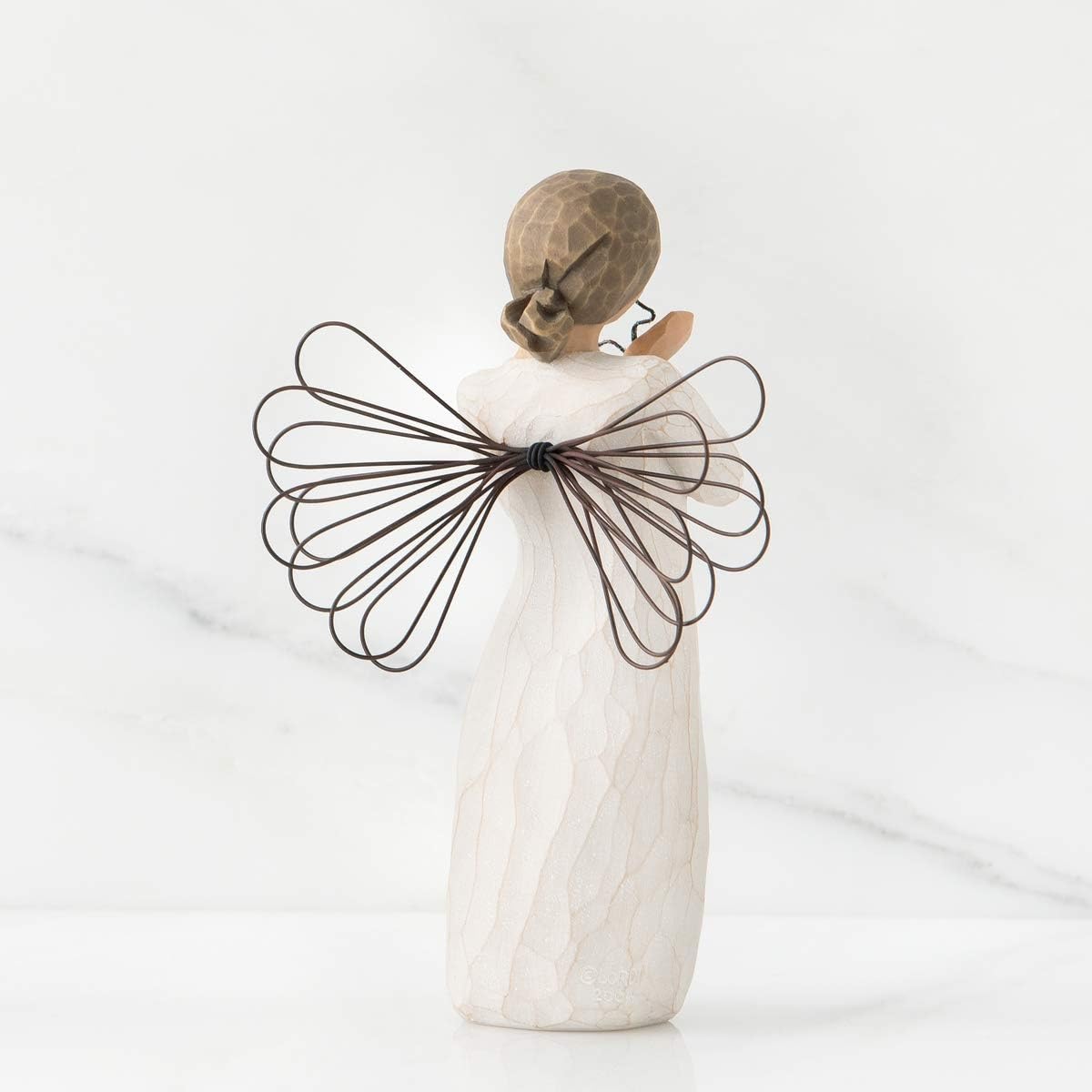 Willow Tree Bright Star packaged in fitted gift box with enclosure card, ready to give