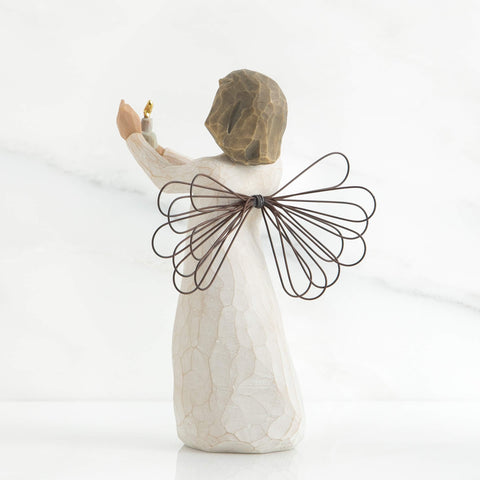 Willow Tree candle detail with gold flame emphasizing delicate focal element for reflection