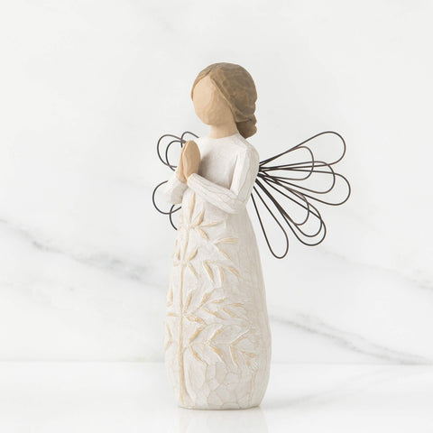 Willow Tree carved tree detail on dress, highlighting symbolic craftsmanship