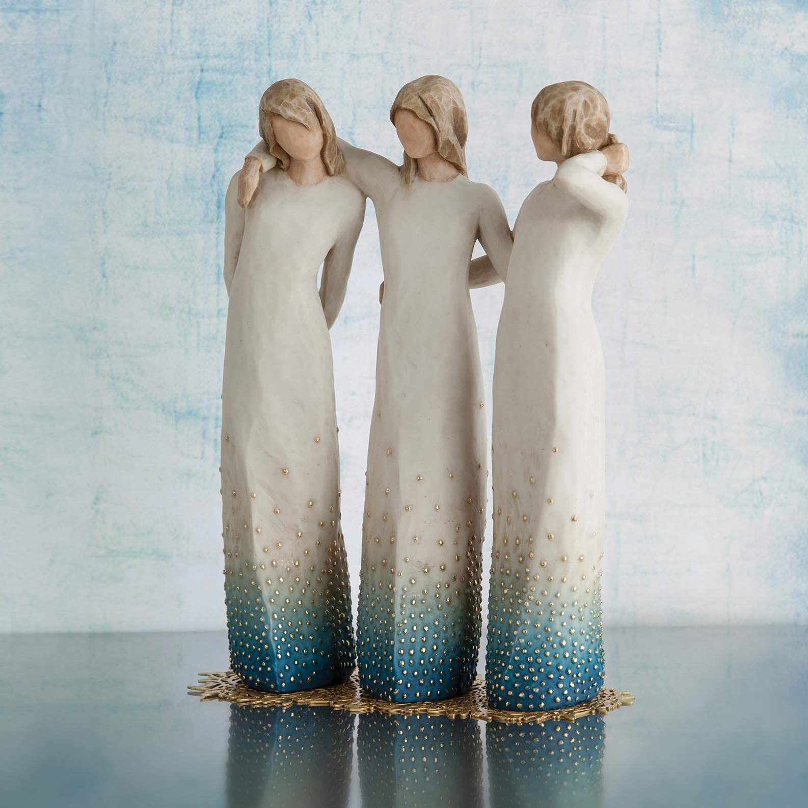 Willow Tree texture of blue ombré skirt and painted dress detail