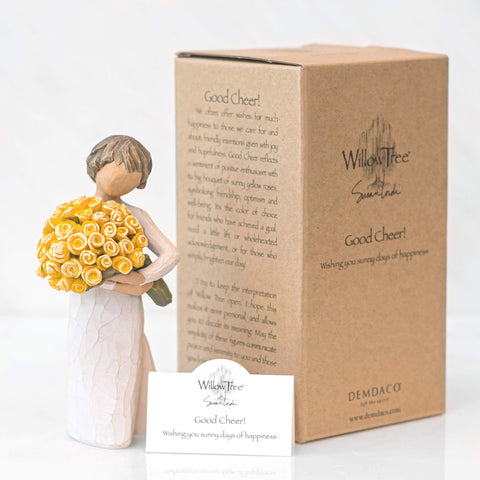 Willow Tree displayed on mantel in a cozy setting adding warm decorative cheer