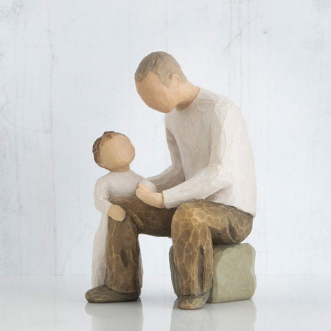 Willow Tree figure displayed in a nursery to suggest gifting and sentimental decor