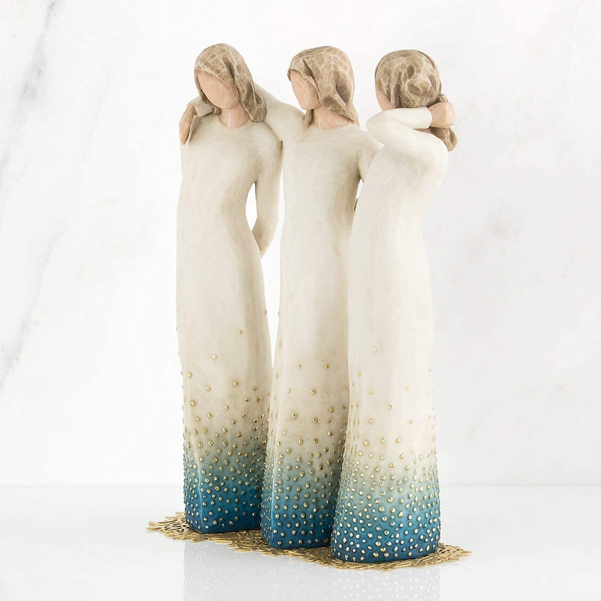 Willow Tree hand detail showing linked arms and comforting gesture