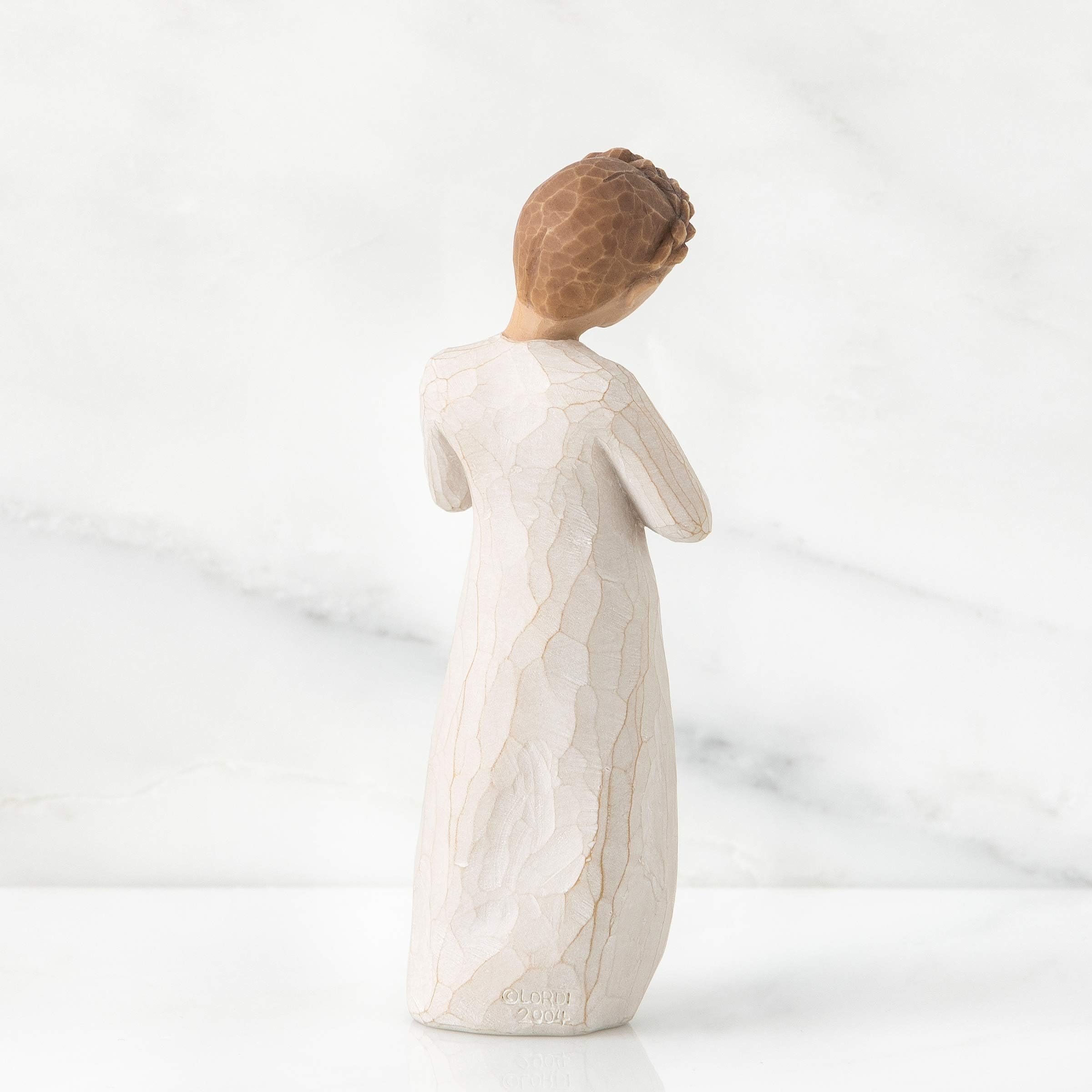 Willow Tree side profile showing hand-painted texture and sculpted silhouette for subtle decor