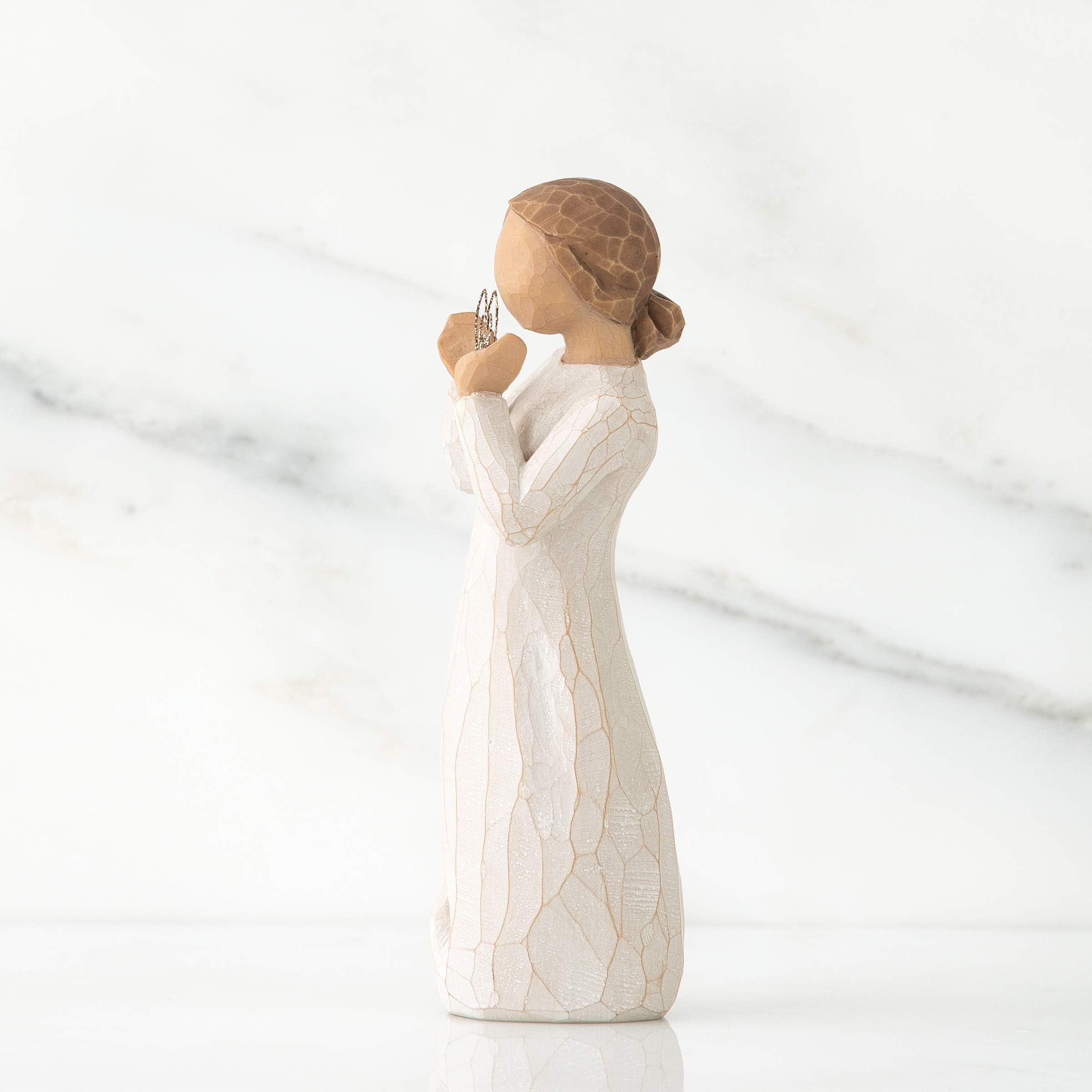 Willow Tree side profile showing sculpted posture and hand-painted texture