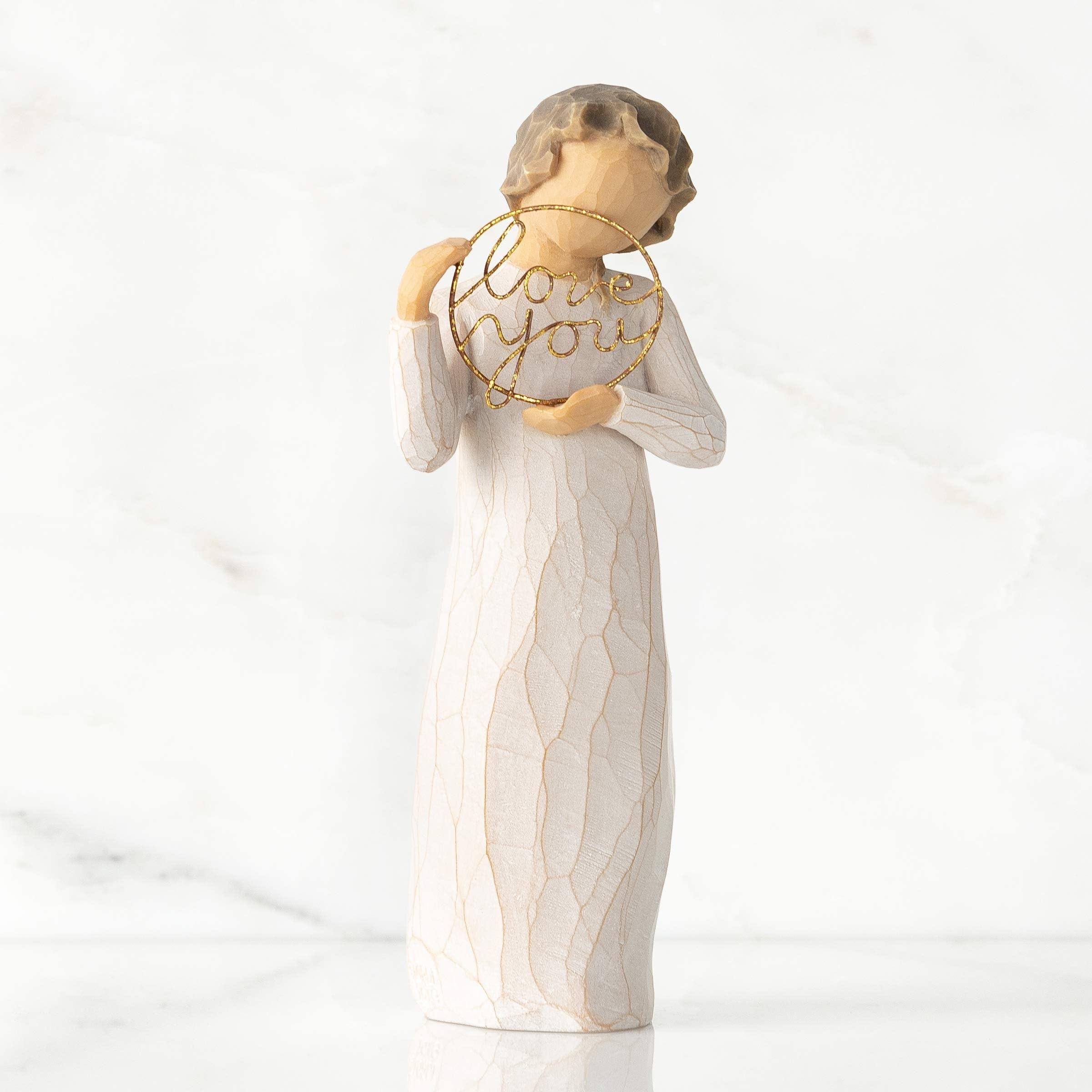Willow Tree side profile of figure highlighting silhouette and dress