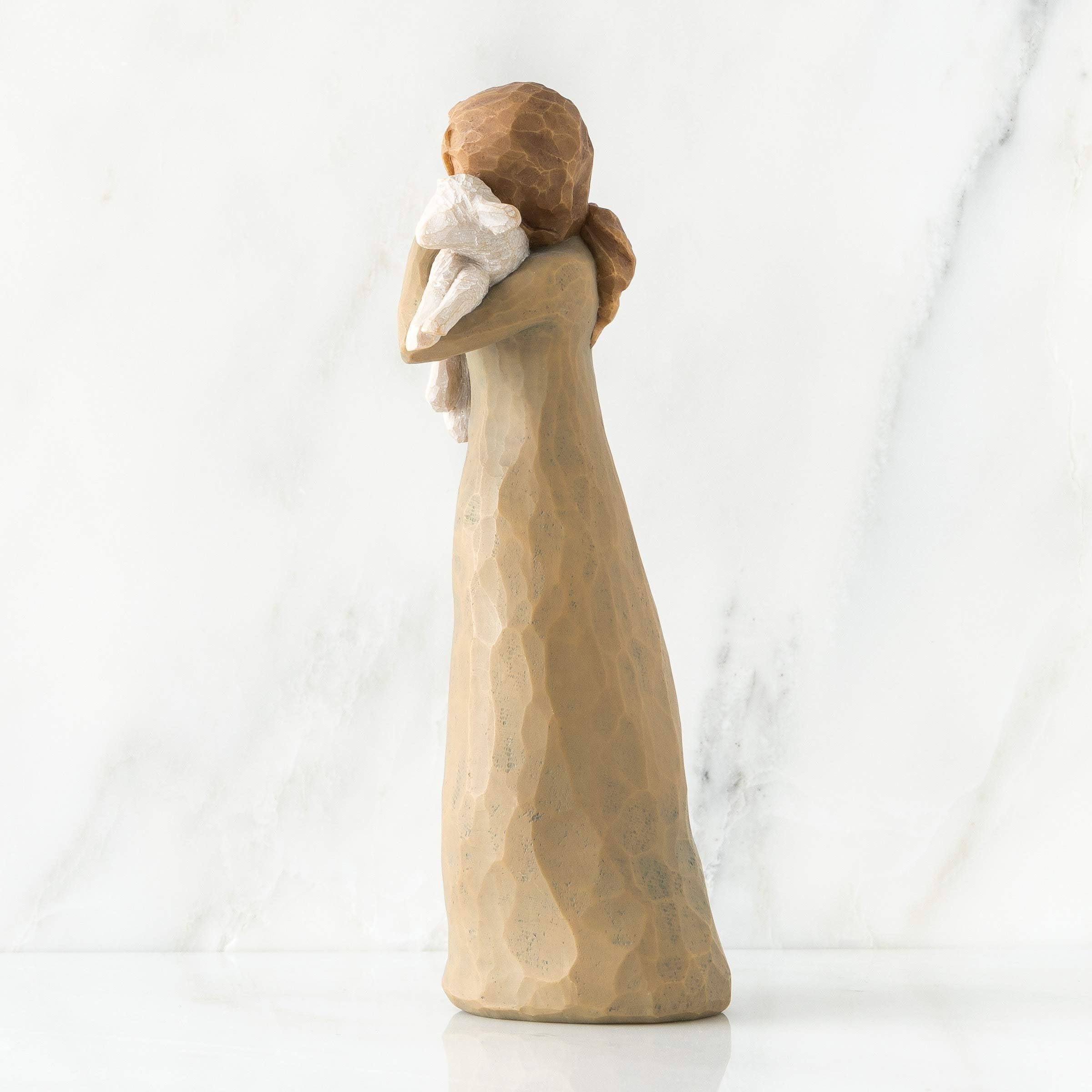 Willow Tree side silhouette highlighting graceful gesture and balance