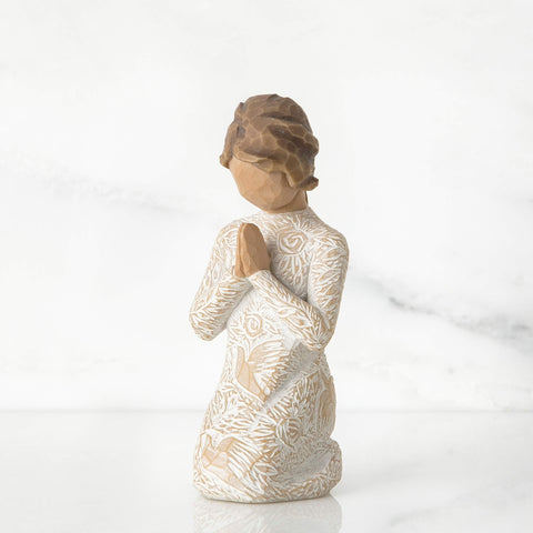 Willow Tree close-up of carved dress details showing delicate texture