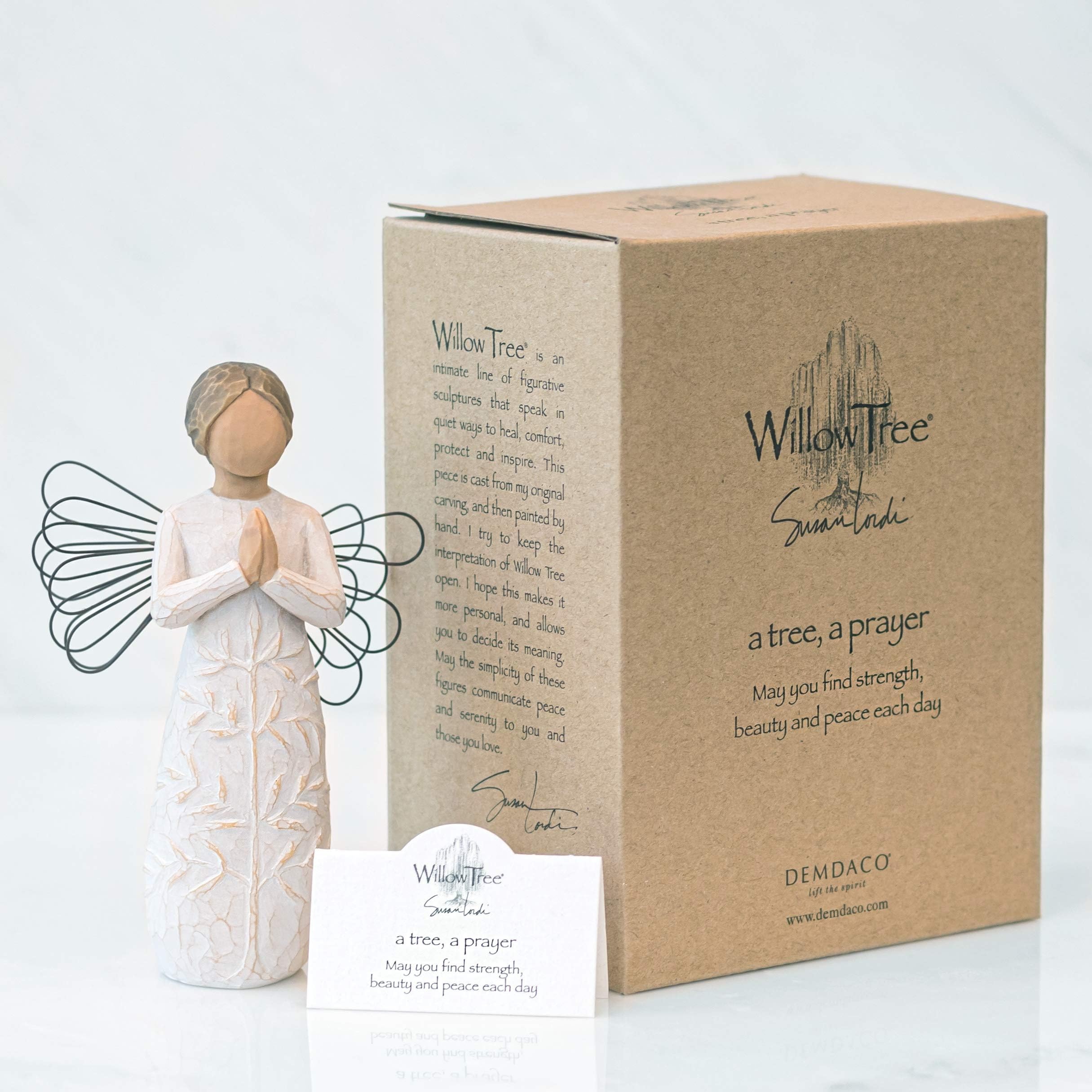 Willow Tree scale with hand, demonstrating the 5.5 inch compact size benefit