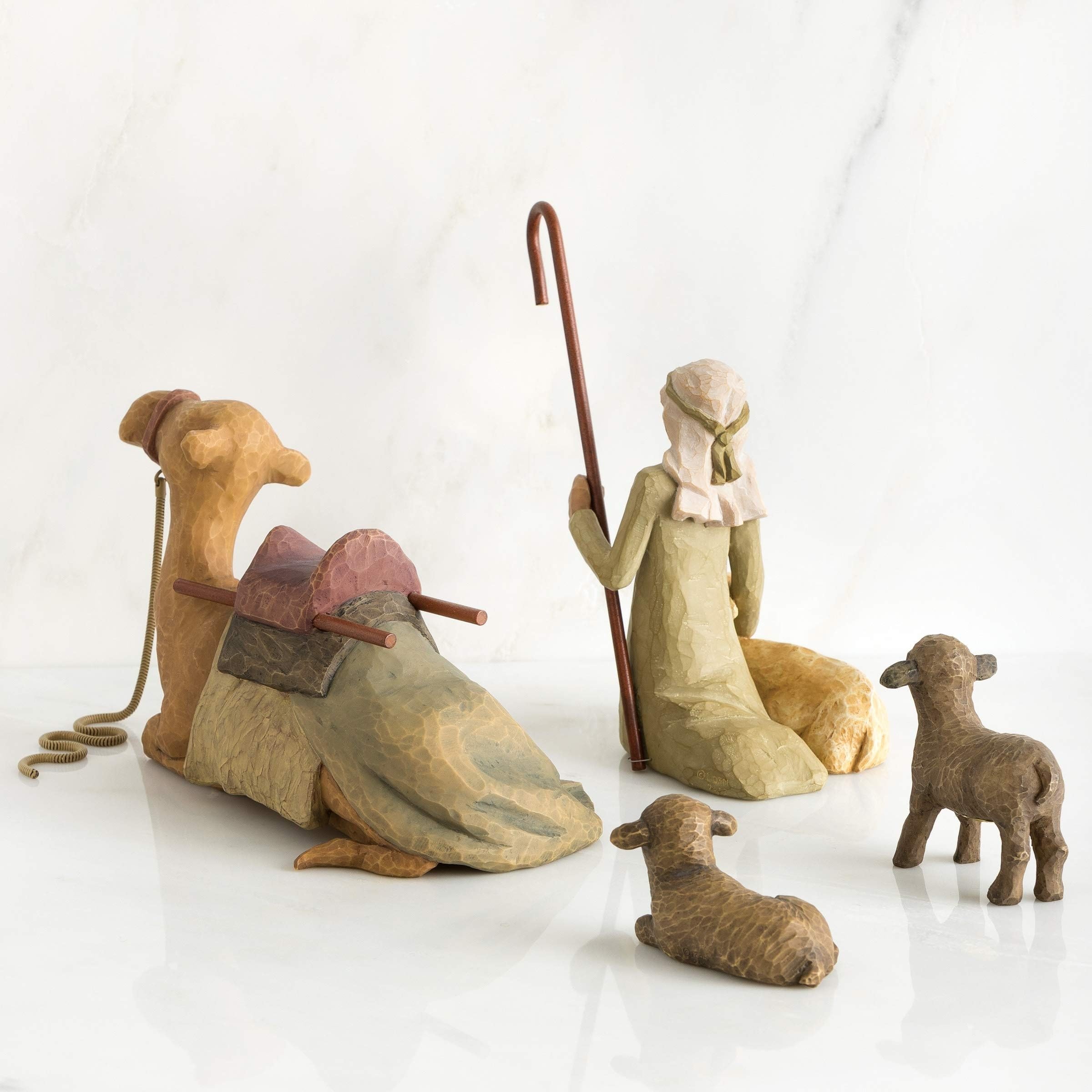 Willow Tree shepherd and animals in mantel display demonstrating calming holiday decor effect