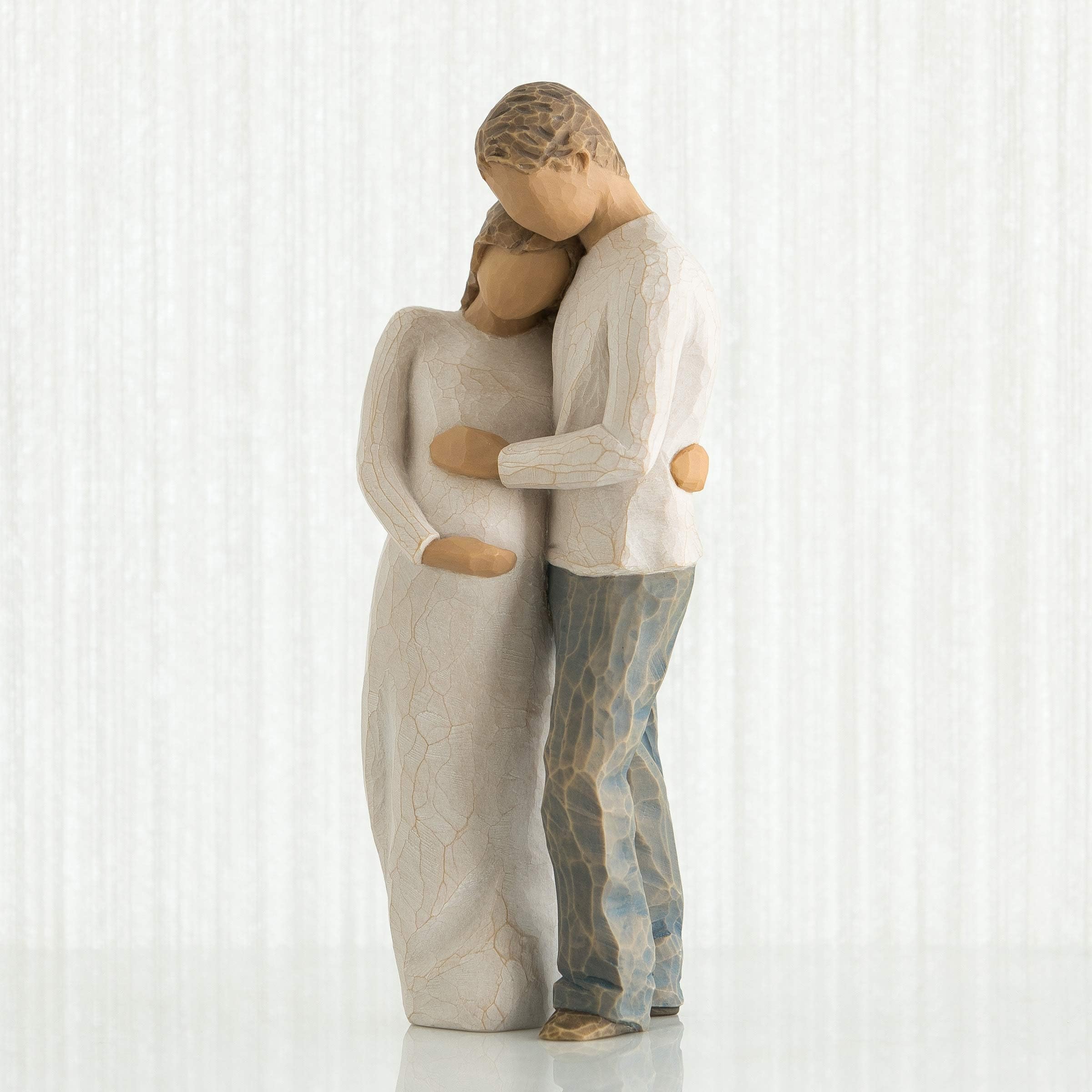 Willow Tree side profile of standing pregnant woman and partner showing connection