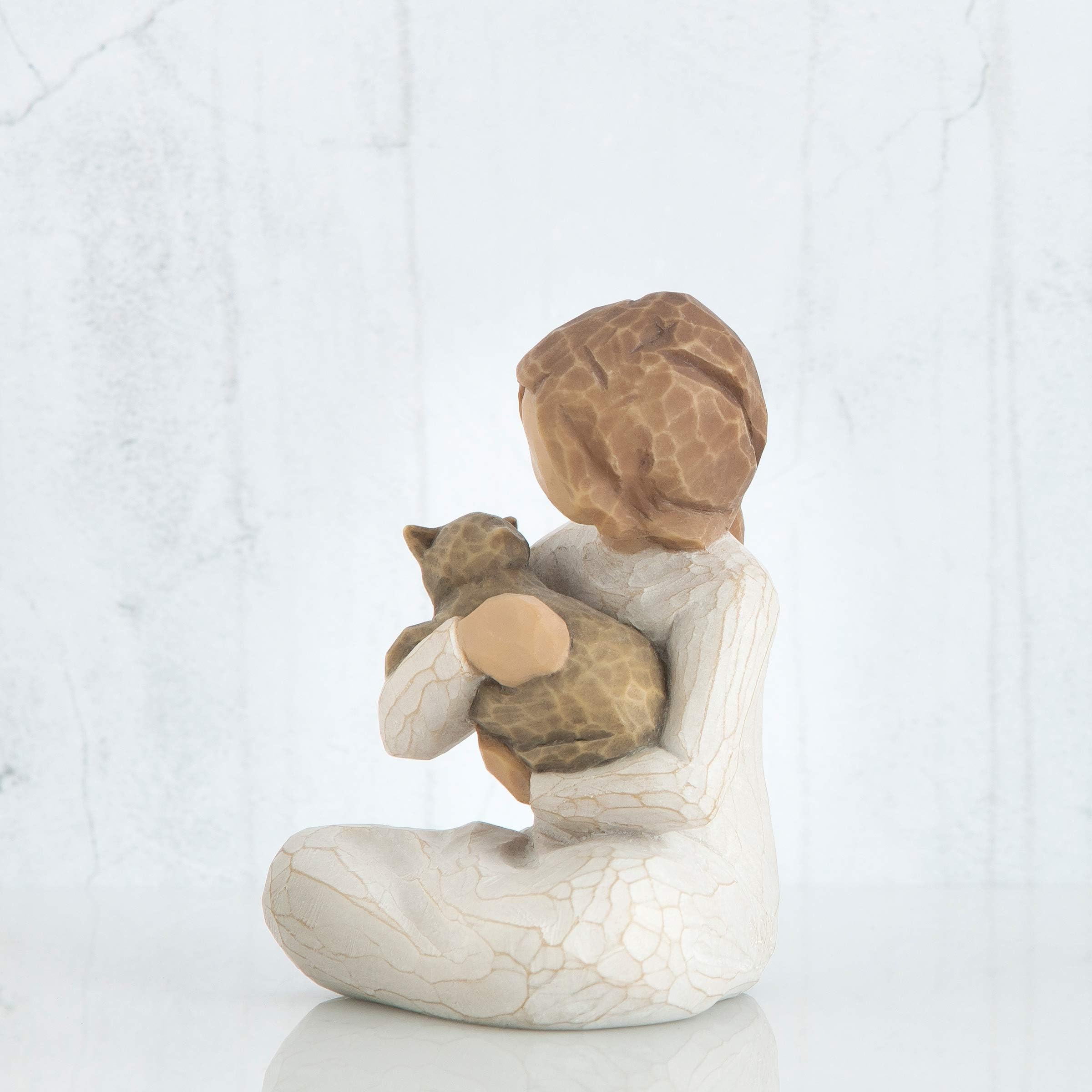 Willow Tree side profile emphasizing carved silhouette and dress folds
