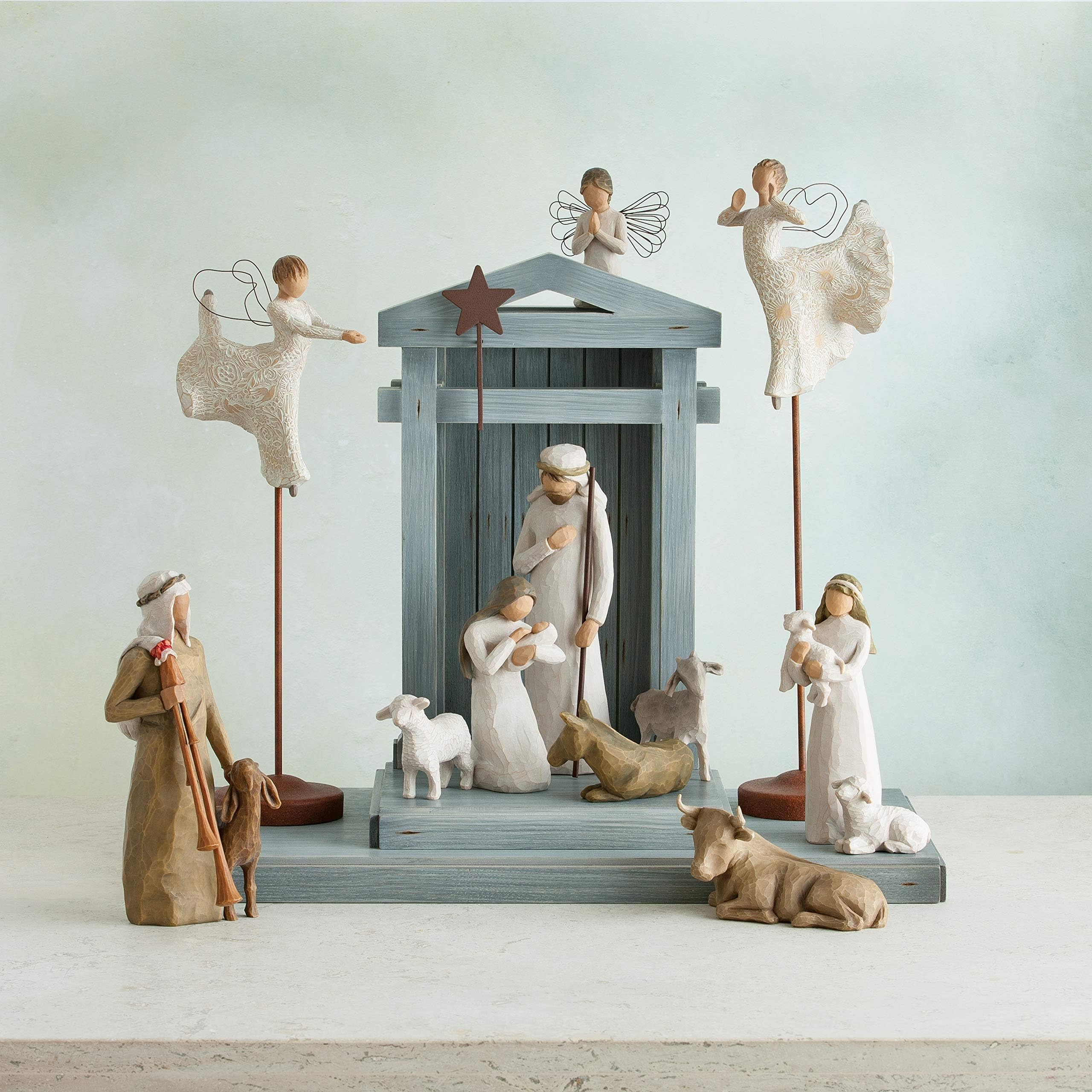 Willow Tree styled mantel with Song of Joy conveying serene décor and comforting presence